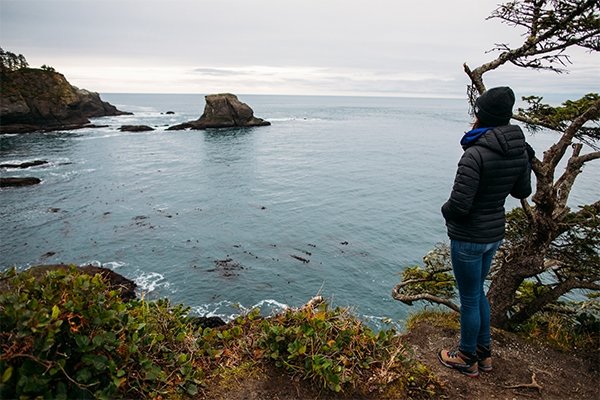 Hiker overlooking the Oregon coast 