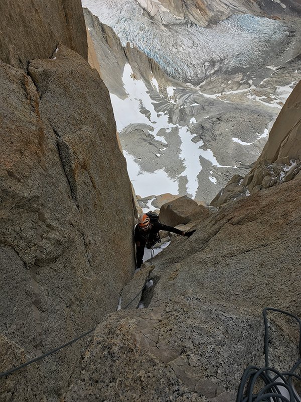Anton Krupicka climbs a snowy dihedral on Guillaumet in Patagonia