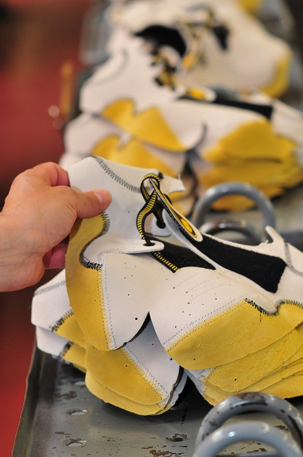 La Sportiva Solution uppers are sorted by size when they are ready to be lasted and completed with soles