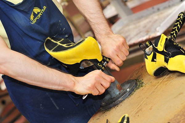 After final stitching is done by hand on the La Sportiva Miura VS, the uppers are hand-lasted before the rands and soles are glued