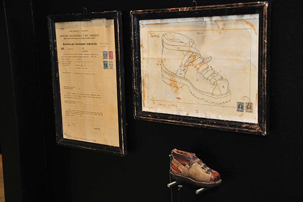 One of the original La Sportiva patents and a miniature model on display at La Sportiva headquarters in Ziano, Italy