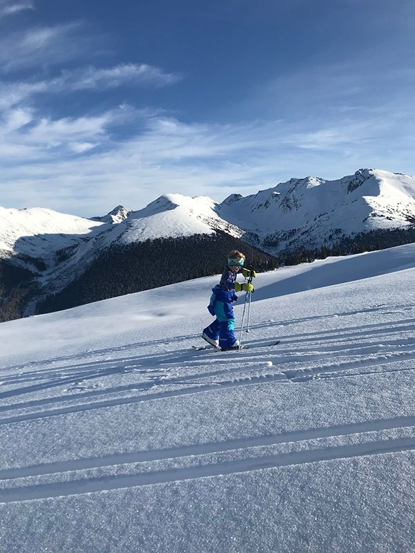 Kylee Toth's son skiing uphill