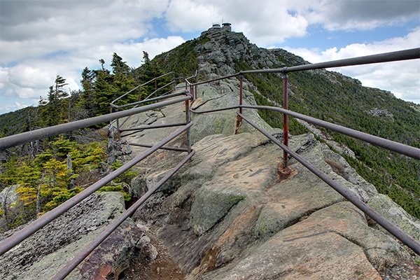 Guardrails line steep and exposed sections of the trail up Whiteface Mountain
