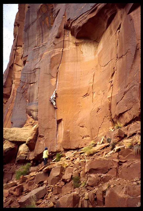 Heidi Wirtz crack climbing with belayer 