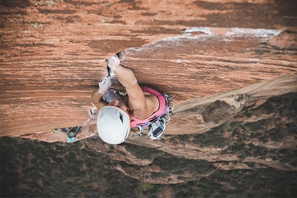 Jenny Abegg laying hand stacks in Zion National Park