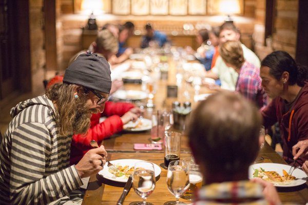 Anton Krupicka and other La Sportiva staff, athletes and media gather for dinner