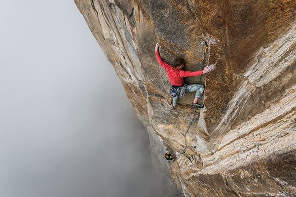 Nik Berry working a sport climbing route. 