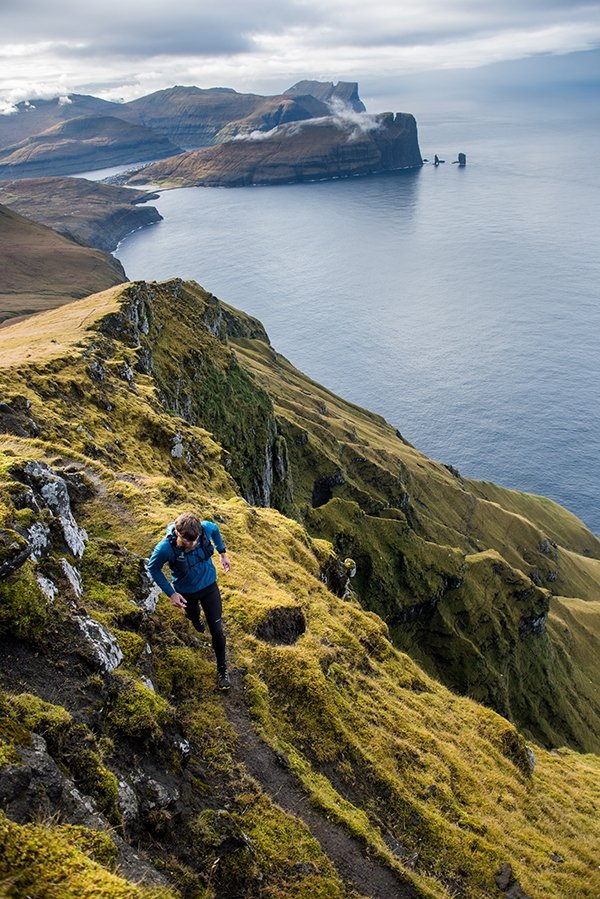 Luke Nelson exploring on, and off, trail in the lush Faroe Islands