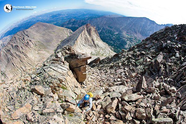 Rannveig Aamodt scrambling on McHenry's Peak during the Shelf Lake Traverse in Colorado