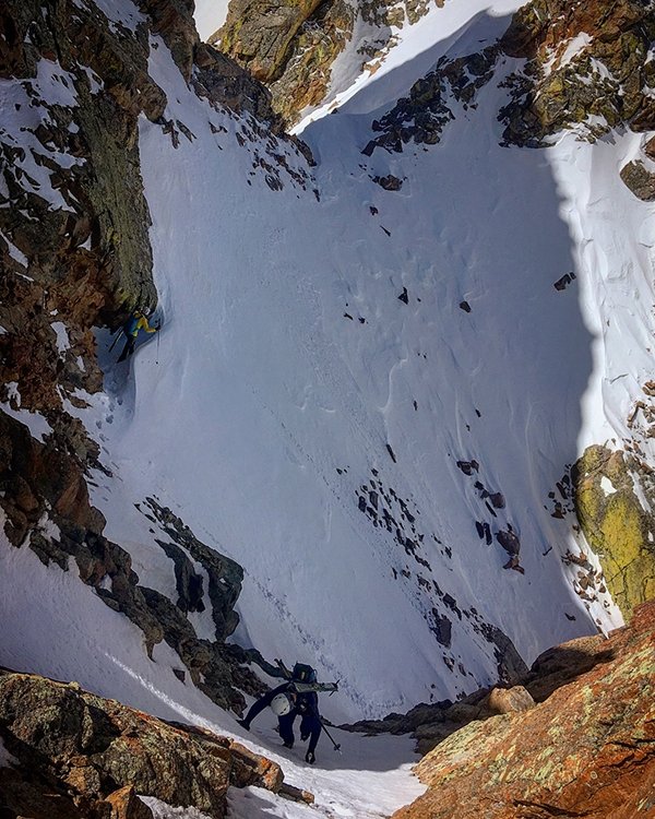 Downclimbing into our descent couloir off the Palomino Ridge. 